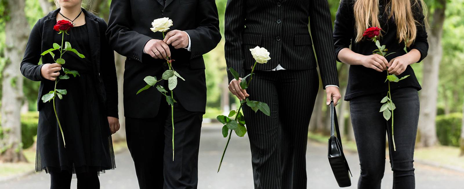 Mourners with flowers